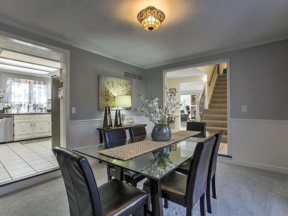 The inviting formal dining room is just steps from the kitchen.