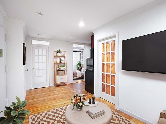 2nd image of 230 E 7th St APT 2A