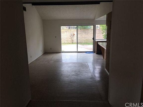 Closer View From Front Door Entrance....Note Vaulted Ceilings.....