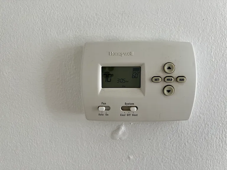 Honywell programmable digital thermostat.