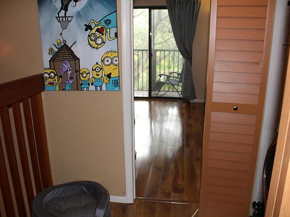 Upstairs looking thru master to balcony