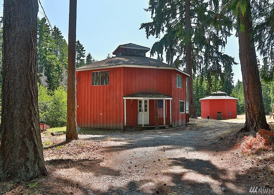 Most likely this home is a tear down.  Note the big fir trees as you come in the drive!