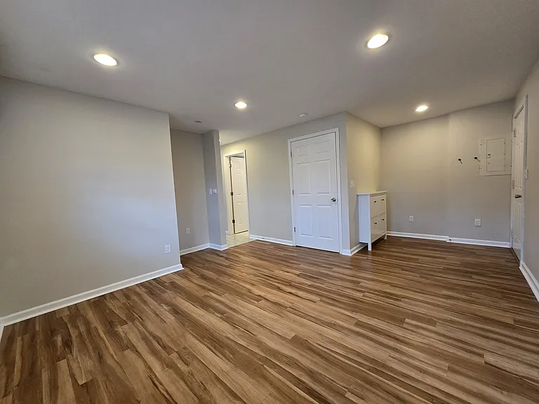 Entrance and Living room, washer/washer/dryer/utility closet