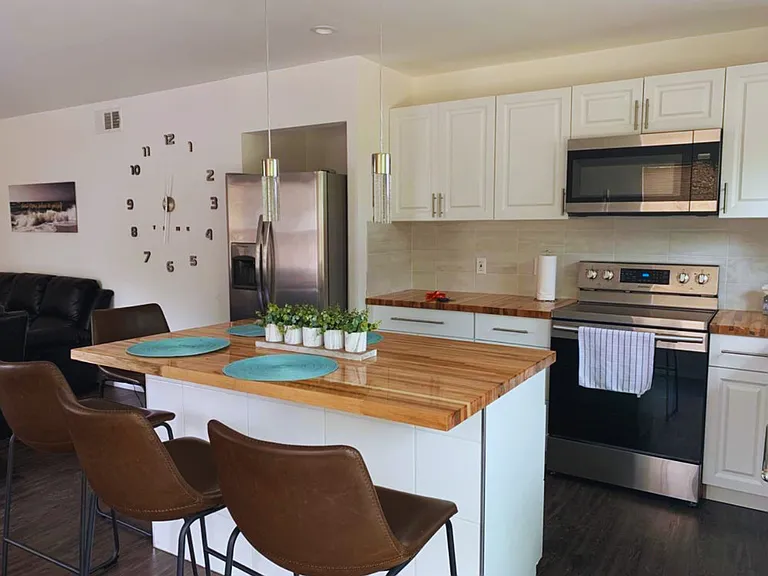 Gather Around This Beautiful 4-Seat Dining Table.
