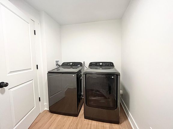 Brand new Samsung washer & dryer in mudroom off the kitchen