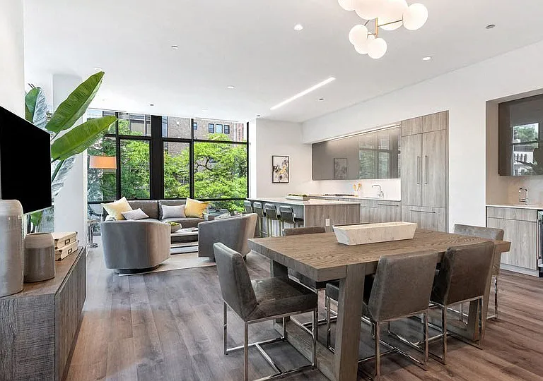 Inspired by rich Art Deco and Mid-Century Modern architecture, 61 Banks Street was meticulously designed by award-winning architect Booth Hansen with interiors by Darcy Bonner.