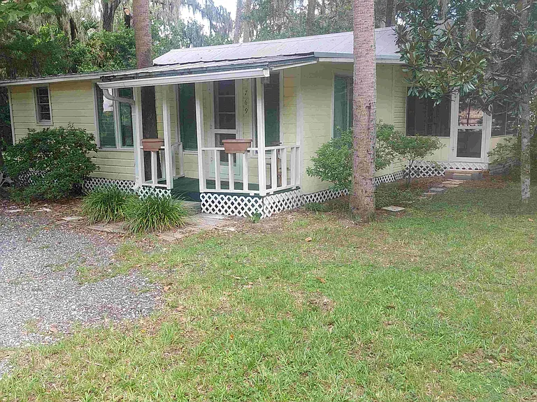 Front entrance to Livingroom and Front Porch
