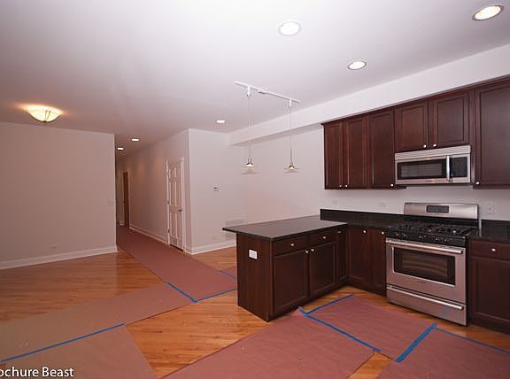 Cherry cabinets, granite counters, stainless steel appliances