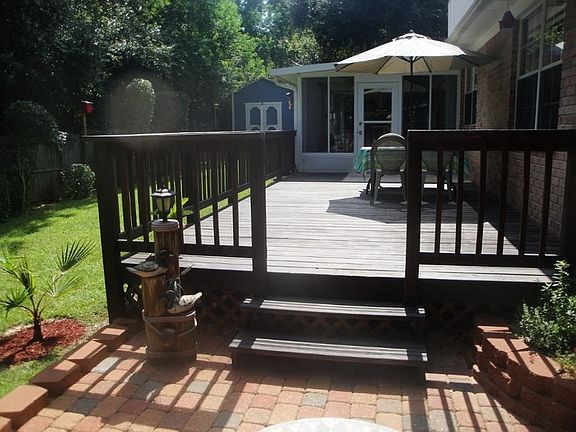 View of Deck, Florida Room, and Shed