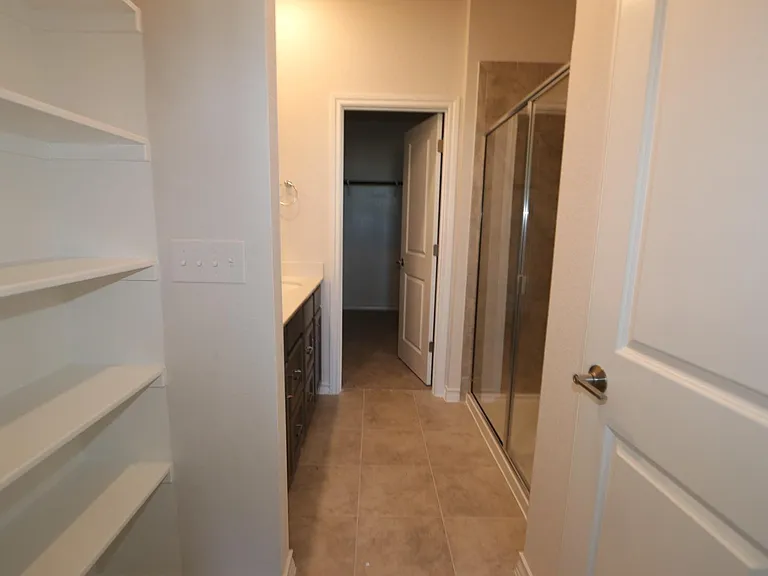 Attached bathroom and closet to the master bedroom