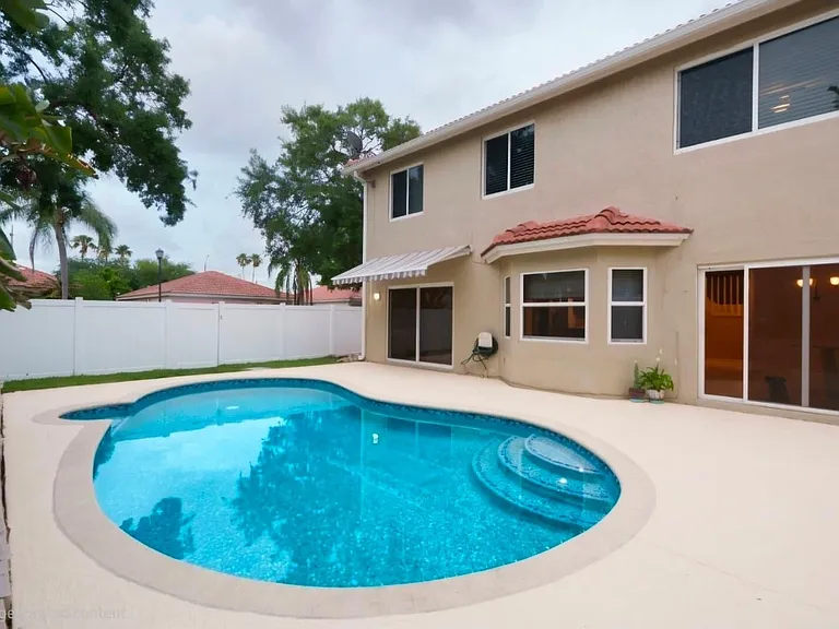 7251 NW 24th Ct — Photo 3