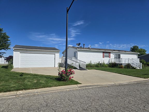 2nd image of 7204 E Grand River Ave Lot 143