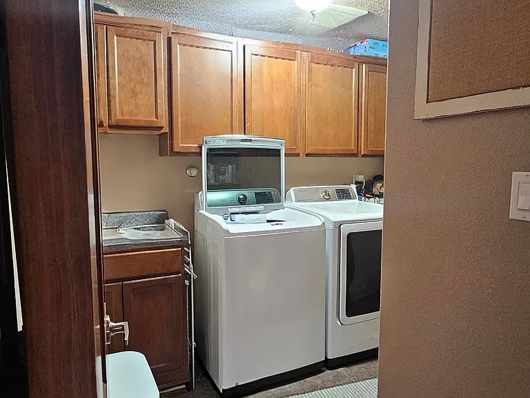 Another view of the laundry room from the kitchen.