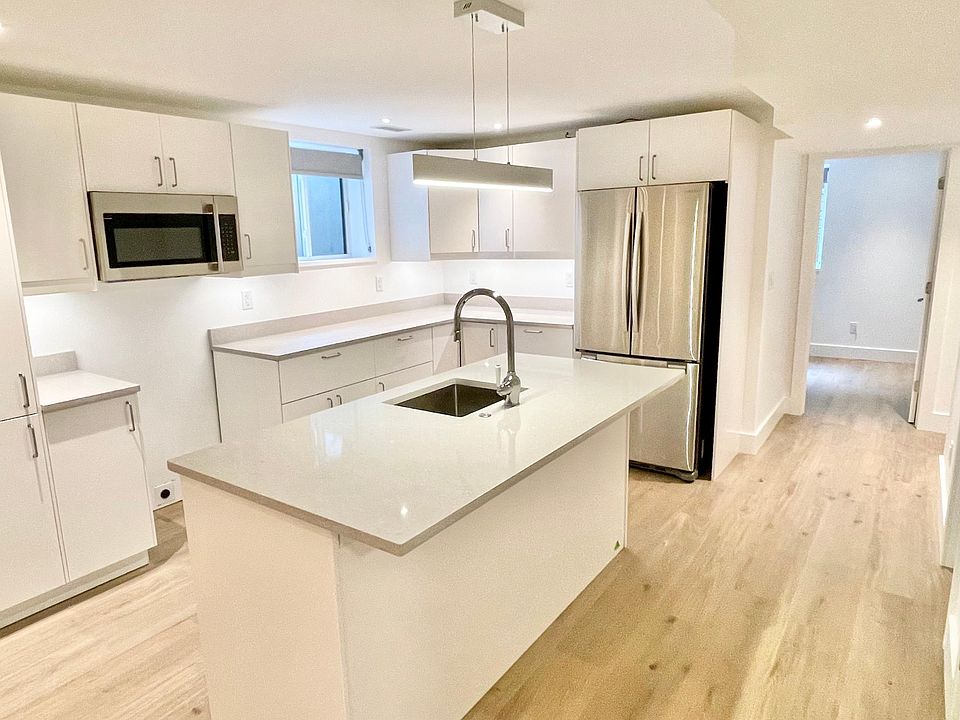 All new cabinetry, solid surface counter tops and appliances
