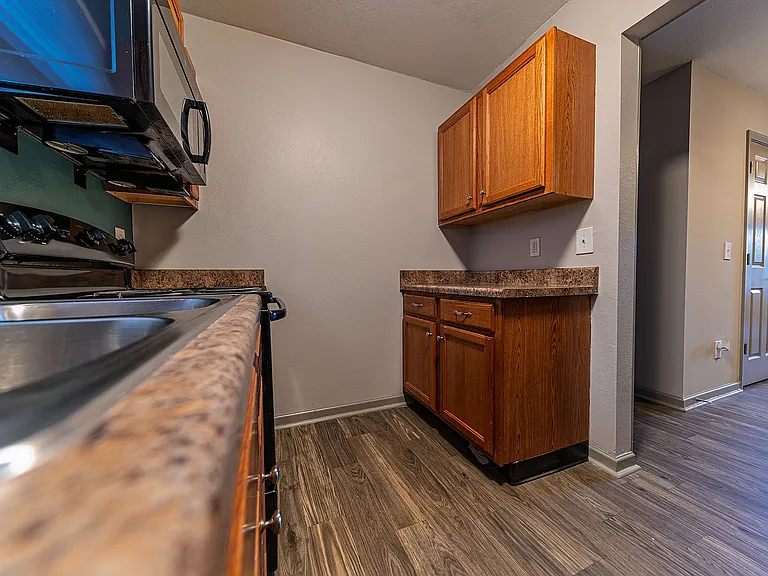 Explore this chic kitchen designed with elegance and functionality in mind.