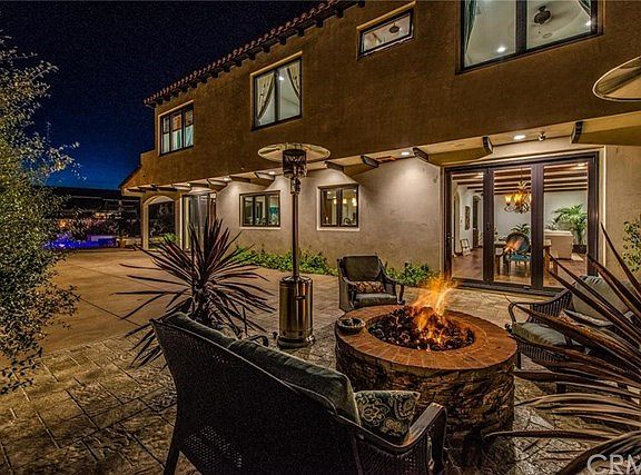 CLOSE-UP VIEW OF THE FIRE PIT AREA IN THE BACKYARD. COLD NIGHT...NO PROBLEM!