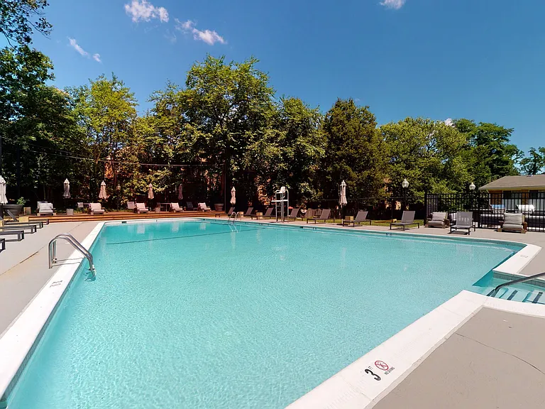 Resort style pool with outdoor entertainment