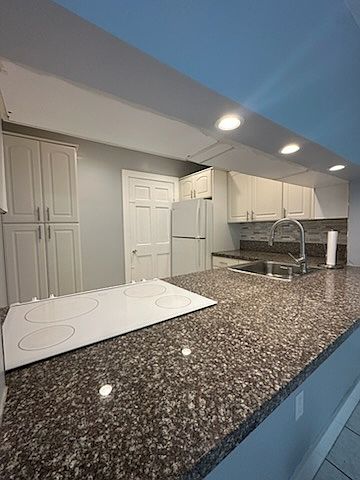 KITCHEN -COUNTER LOOKING INTO LIVING AREA