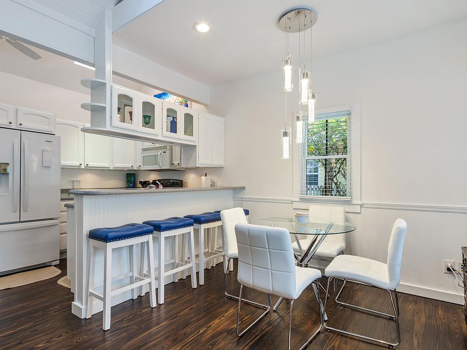 Dining area, kitchen, and bar