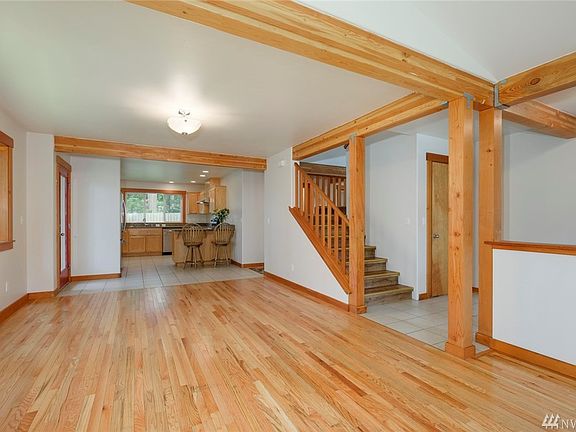 Tiled entry on right.  Closet is large storage area that stretches to hall behind.  