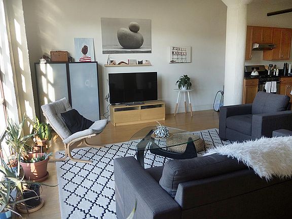 Large open living room / great room with abundant natural li