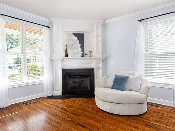 Relax in a comfy seat by a gas fireplace