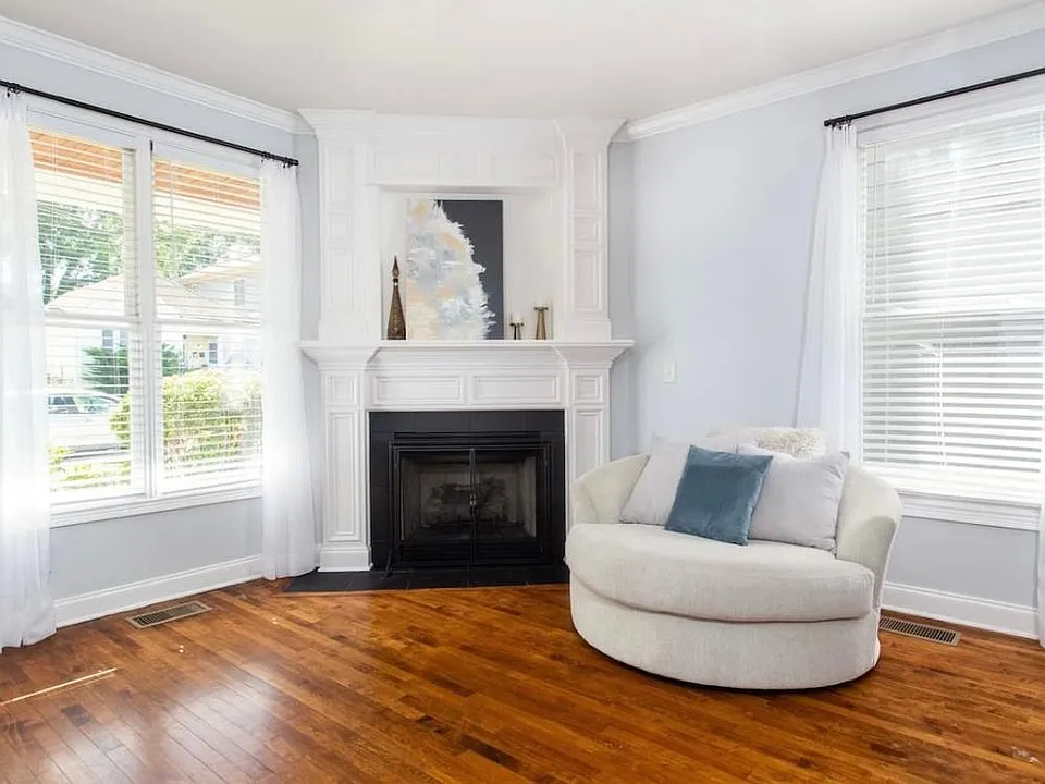 Relax in a comfy seat by a gas fireplace
