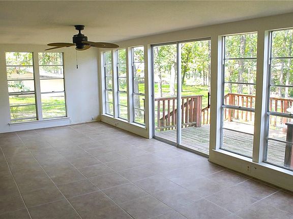 sunroom with views to the backyard
