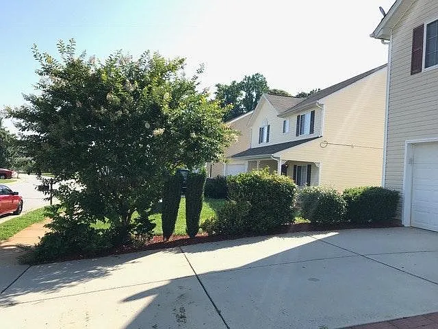 Spacious driveway to hold two cars