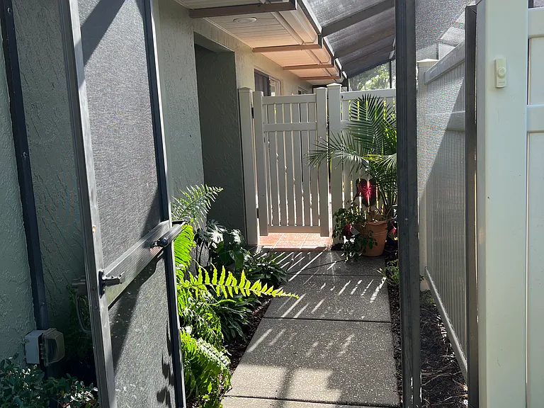 Front gate entrance to front door and separate gate to patio. Both gates can be locked.