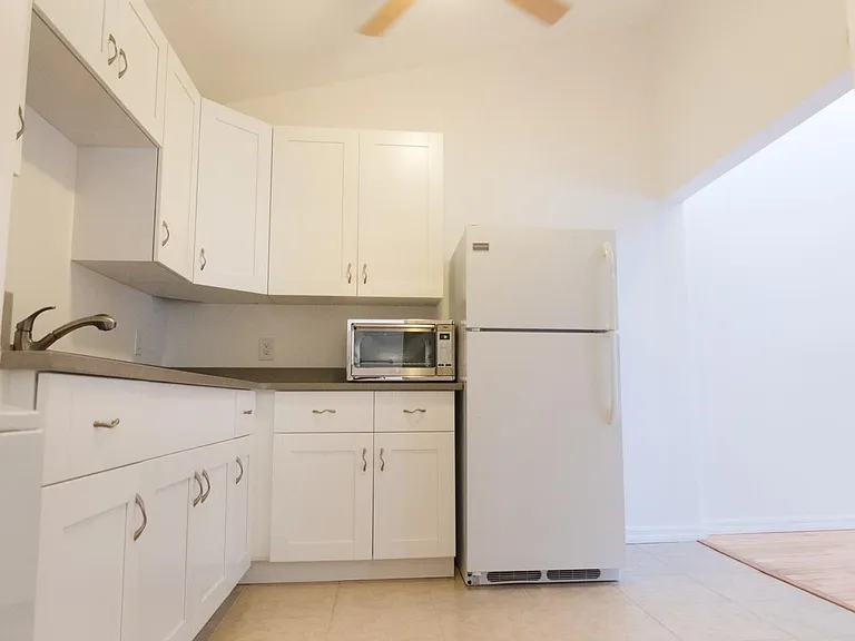 High ceiling, extra larger capacity countertop oven & 2 countertop induction burners included