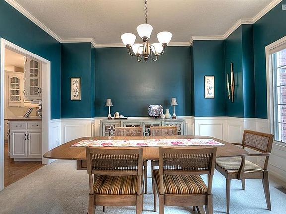Formal dining room with extensive wood trim