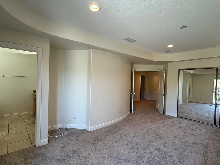 Master Bedroom with mirror walk in closet