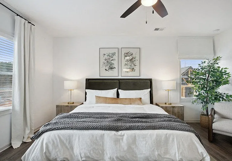 The king size bed in the primary suite.