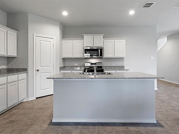 Kitchen- All Home and community information, including pricing, included features, terms, availability and amenities, are subject to change at any time without notice or obligation. All Drawings, pictures, photographs, video, square footages, floor plans, elevations, features, colors and sizes are approximate for illustration purposes only and will vary from the homes as built.