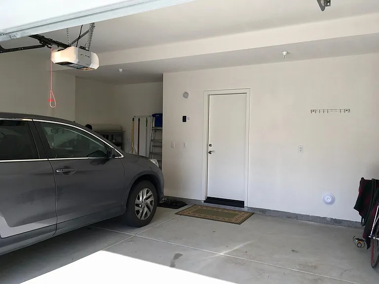 2-car garage with visitor parking alongside units