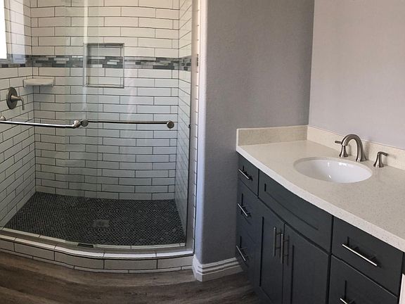 Master bathroom fully renovated with new fixtures and walk in shower.