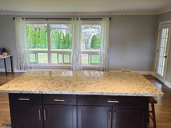 Beautiful view to the living/dining room and backyard .