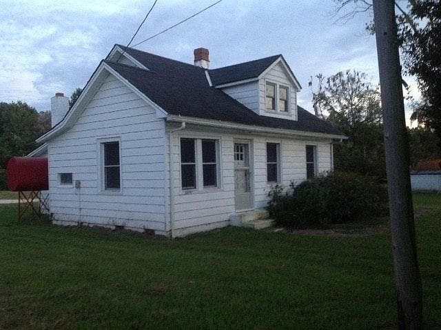 Outside before renovation (tank is gone)