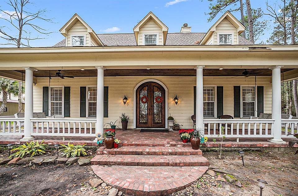 TRANQUIL COUNTRY LIVING AWAITS YOU!: Welcome to 1803 Ridgewood Drive, a totally upgraded home nestled in Magnolia, TX, located on 5.75 acres.