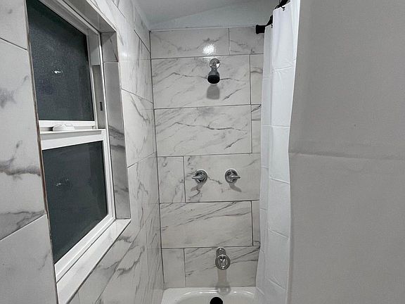 Tile throughout entire shower