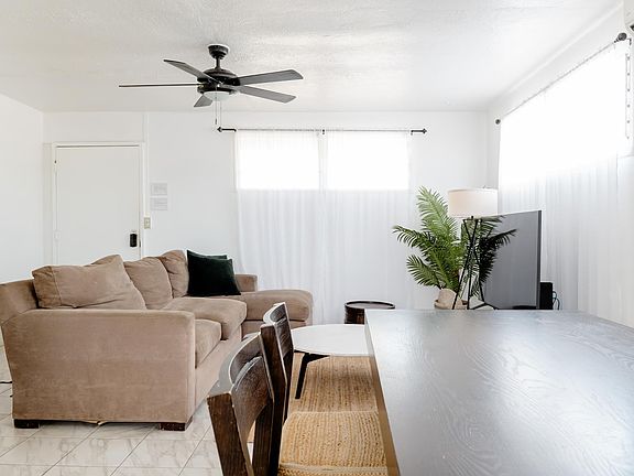 Gather around your cozy living room equipped with high powered air conditioning.