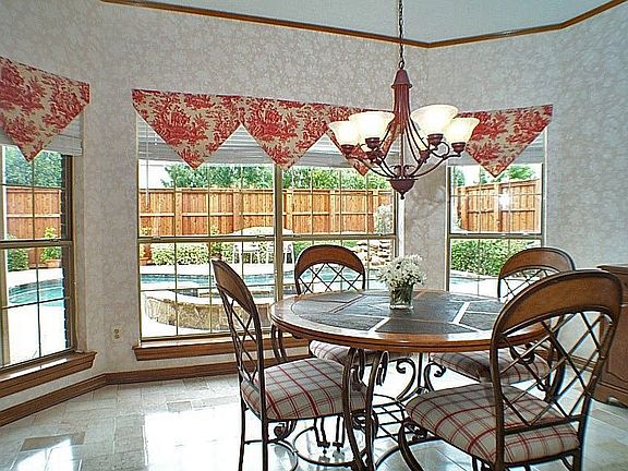 Breakfast nook with great view of pool.