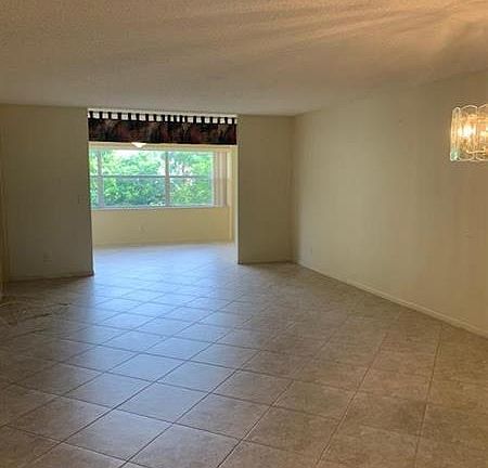 3rd image of 9561 Sunrise Lakes Blvd APT 306