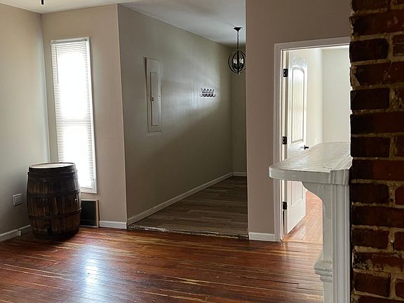Living room looking towards entry and bedroom