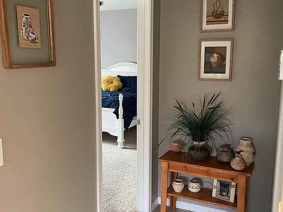 Hallway to primary bedroom