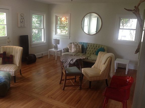 Bright Sunny Living Room with Refinished Hardwood Floors