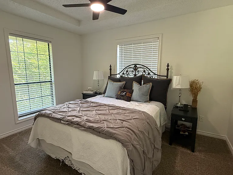 One of the three upstairs bedrooms. With furniture to show scale.