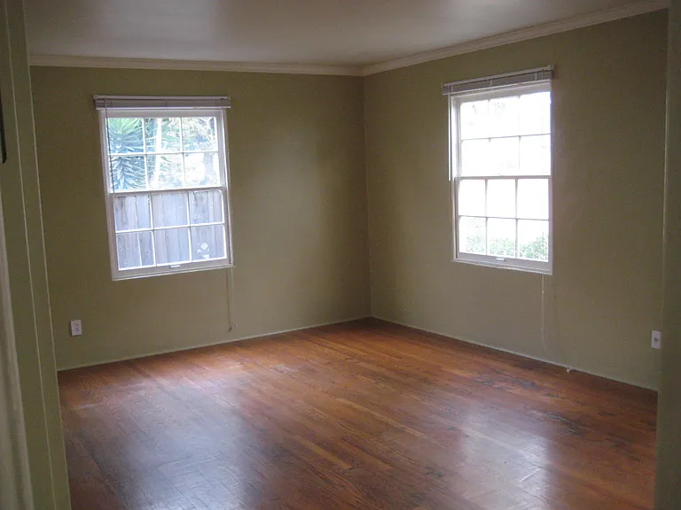 Real hardwood floors throughout with lots of windows for natural light