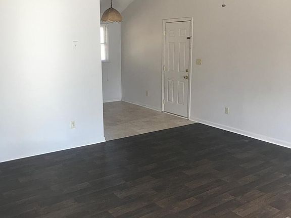 View from front door into living room & dining area